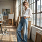 Pantaloni donna in denim a zampa larga con jacquard floreale