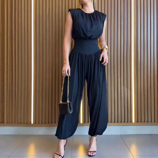 💎 -50% sull’elegante tuta a vita alta! 💎 Spalline imbottite, vita a corsetto e spacco drammatico per un look di grande impatto ✨